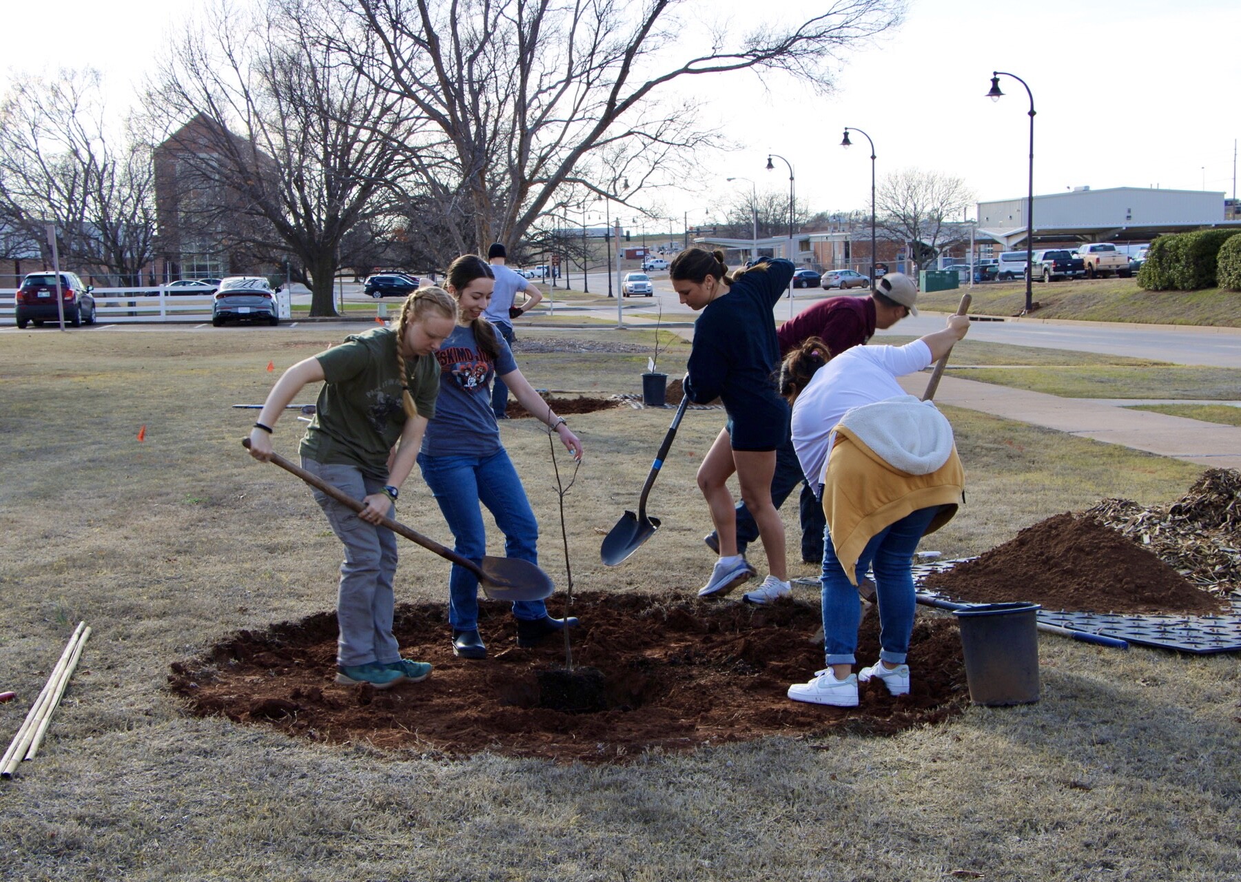 Students digging Students digging